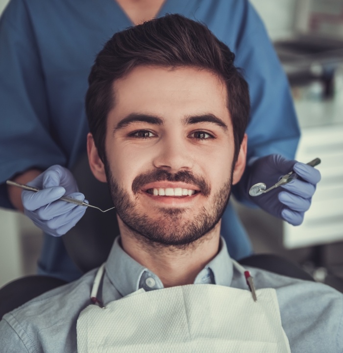 Man smiling during dental visit