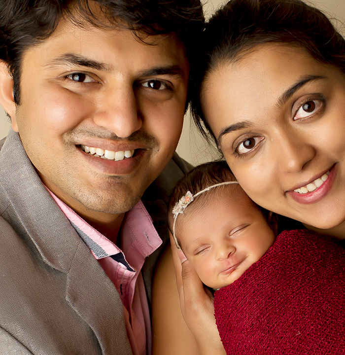 Mansfield Texas dentist Doctor Rushabh Doshi with her husband and baby