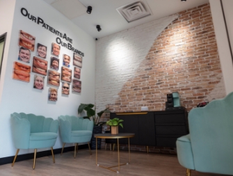 Dental office reception area with white walls