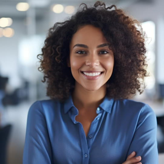 Close up of woman in blue shirt smiling